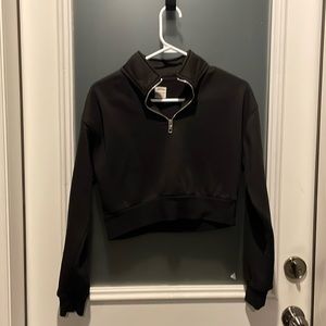 Small black sweatshirt from Ardene. Crop top polo style.